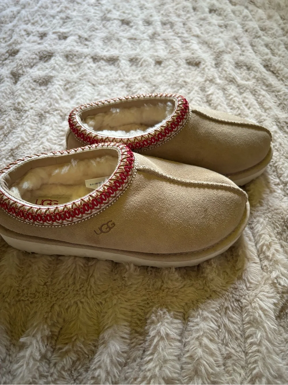 UGG Kids Tan Shearling Slip-On Slippers with Red Trim